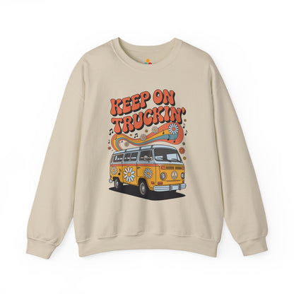 Retro “Keep On Truckin’” van graphic printed on a TEEZOCA unisex crewneck sweatshirt with colorful flowers and musical details Beige sweatshirt with a graphic of a van and 'Keep on Truckin'' text on a white background