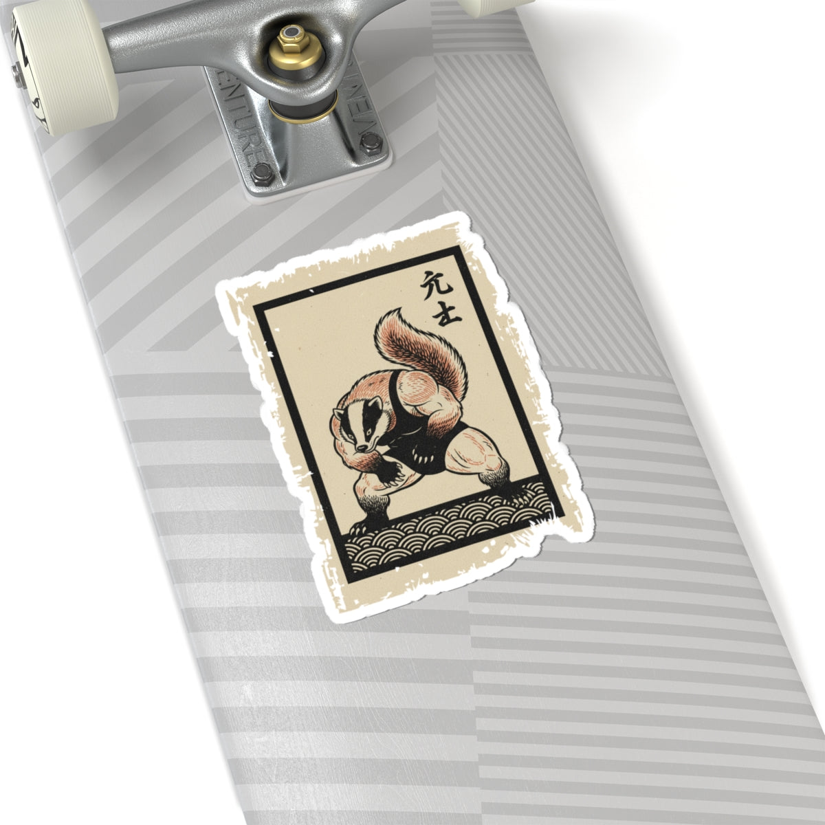 Skateboard with a decorative sticker featuring a badger in traditional attire on a white background
