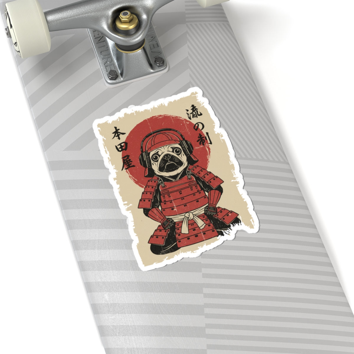 Skateboard with a sticker of a pug in samurai armor and headphones on a white background