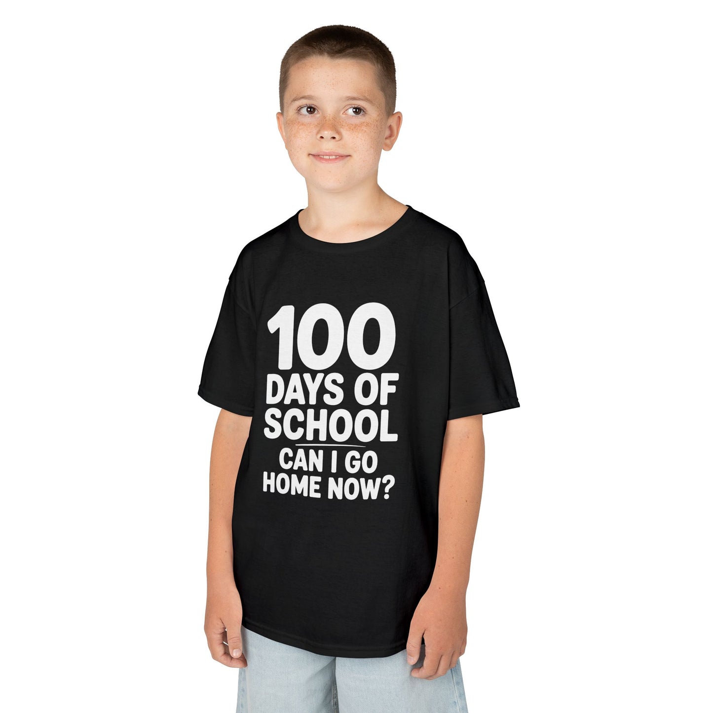 Smiling child wearing a black TEEZOCA “100 Days Of School Can I Go Home Now?” kids t‑shirt.