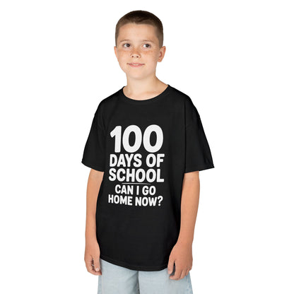 Smiling child wearing a black TEEZOCA “100 Days Of School Can I Go Home Now?” kids t‑shirt.