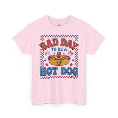 TEEZOCA 4th of July graphic tee with funny bbq shirt artwork, checkered border, Uncle Sam hat, and hot dog pun slogan.
