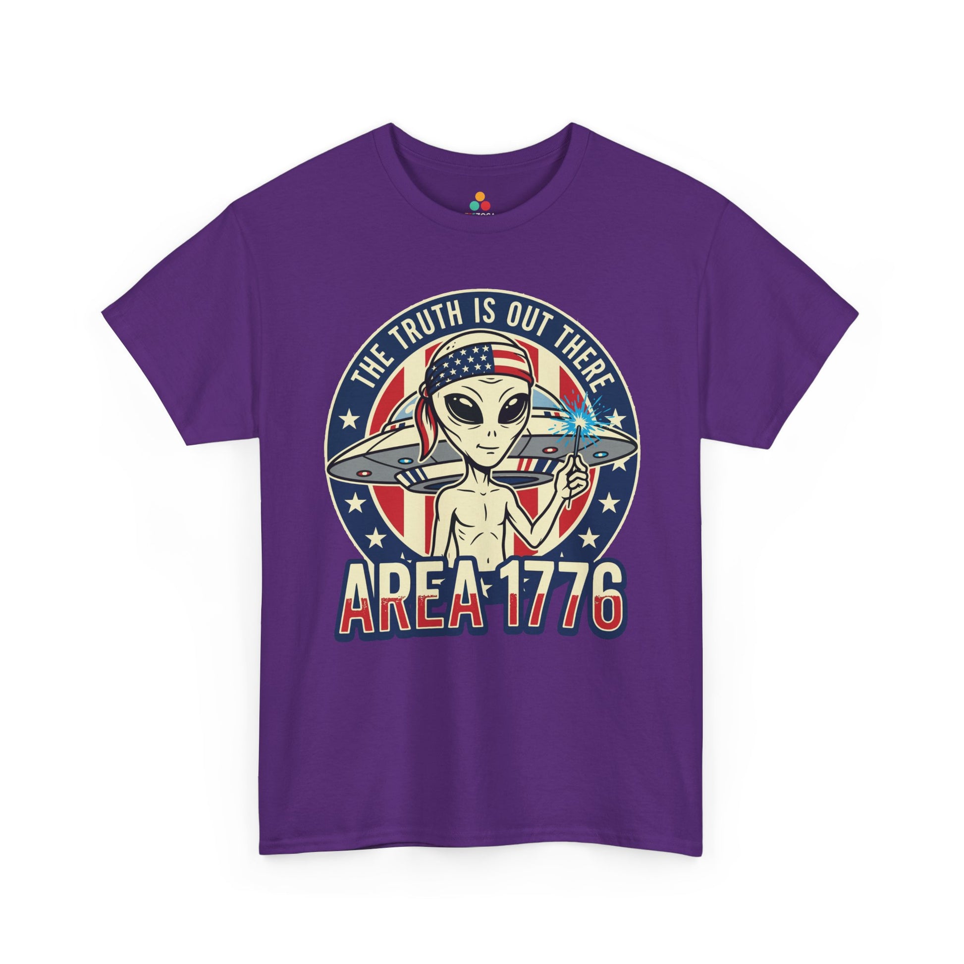 TEEZOCA Alien Shirt T-shirt featuring an alien in an American flag bandana holding a sparkler in front of a UFO.
