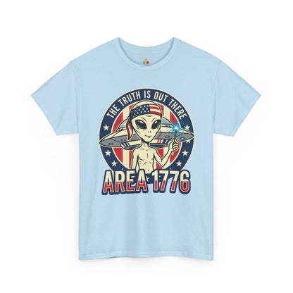 TEEZOCA Alien Shirt design with a retro alien graphic, American flag headband, flying saucer, and bold patriotic badge art.

