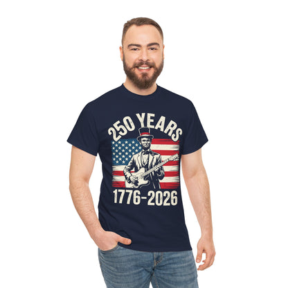 TEEZOCA America 250 Shirt t-shirt featuring Abraham Lincoln with a guitar, American flag backdrop, 250 Years text, and 1776-2026 date.
