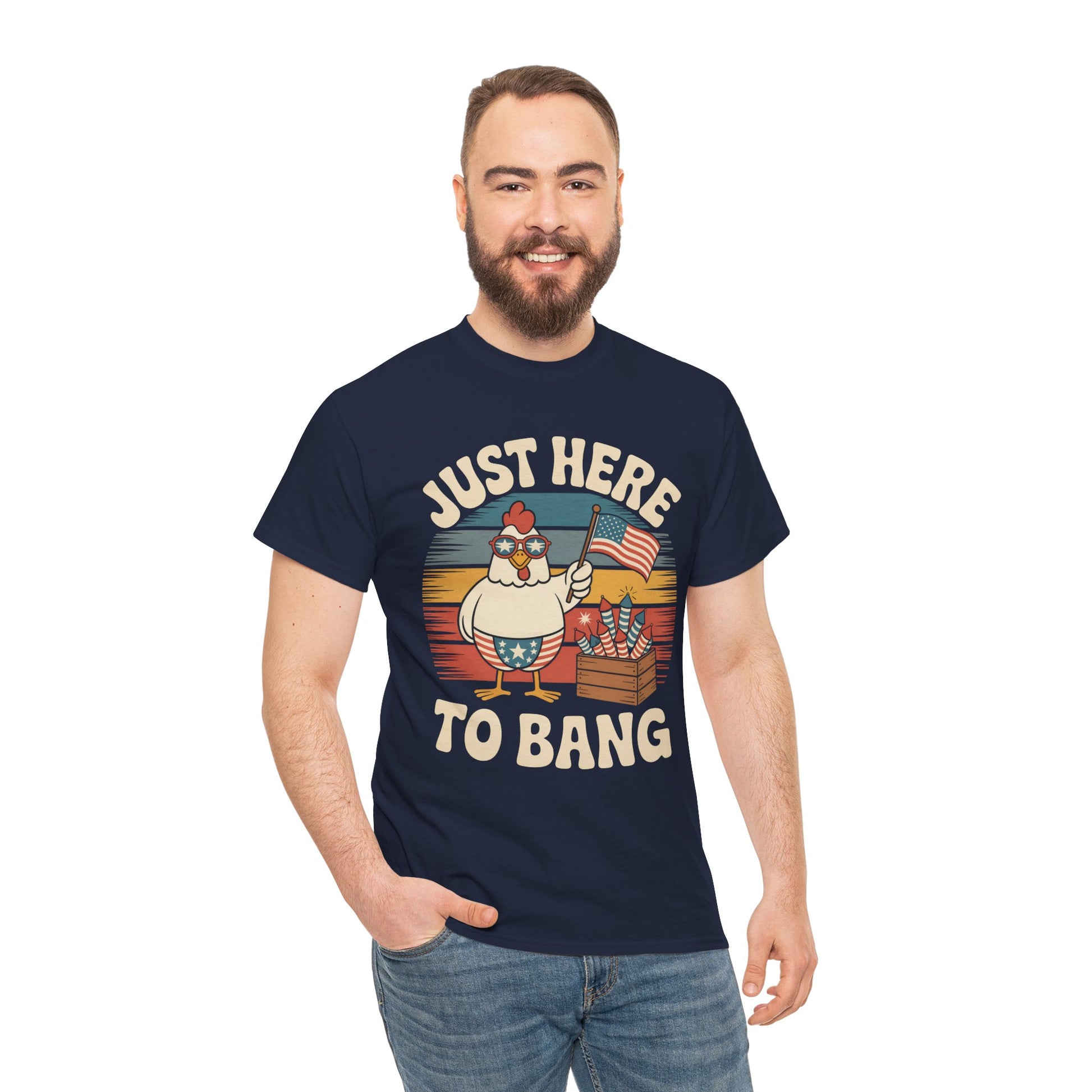 TEEZOCA Funny 4th of July Shirt t-shirt with rooster, fireworks crate, American flag, sunset badge, and Just Here to Bang slogan.
