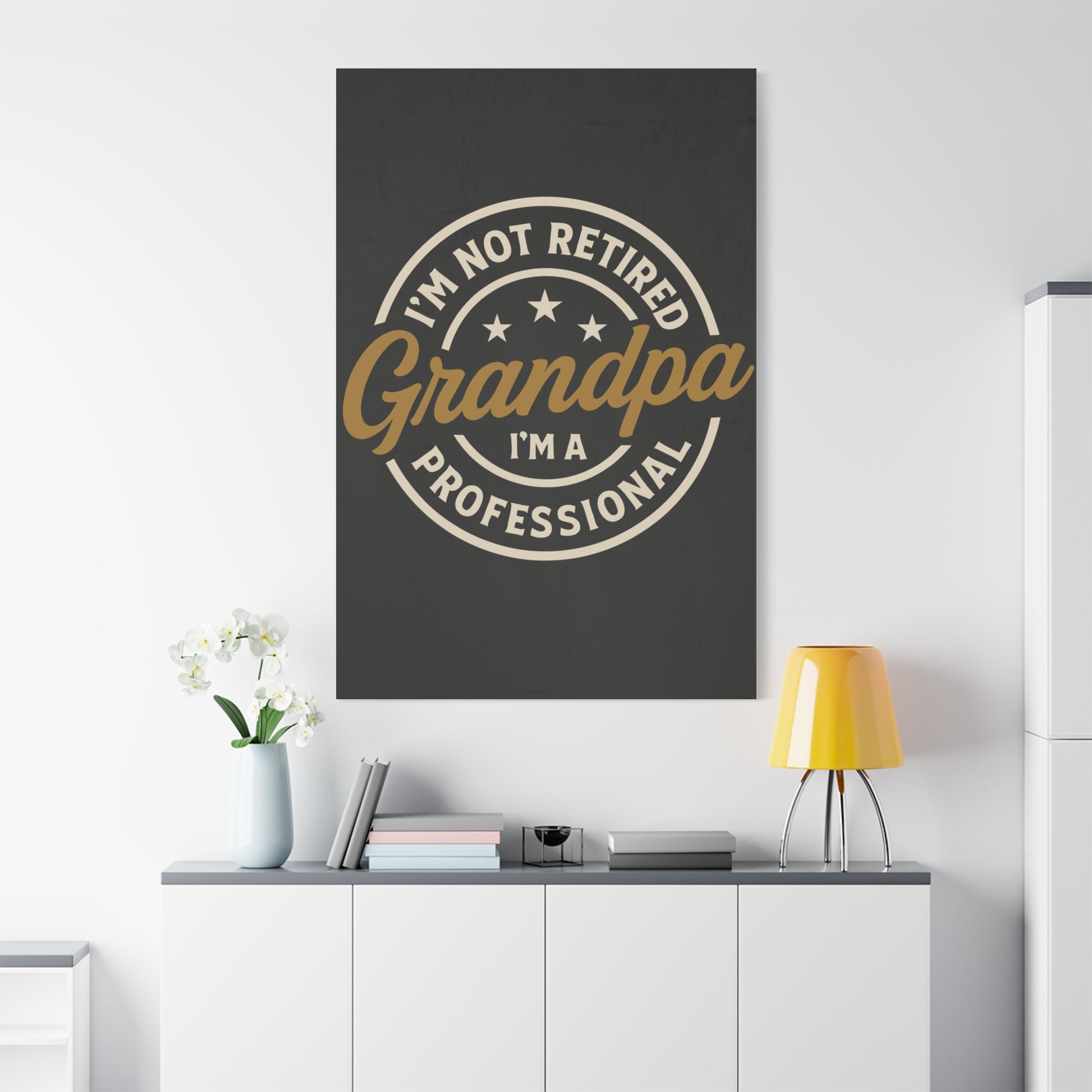 TEEZOCA “I’m Not Retired Grandpa I’m a Professional” canvas featured in a bright minimalist room.