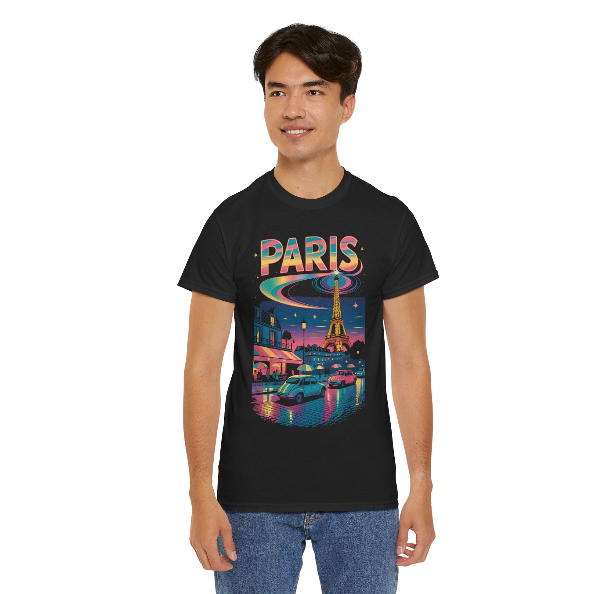 TEEZOCA Paris skyline at night graphic Unisex T-shirt Person wearing a black t-shirt with a colorful 'Paris' design on a white background