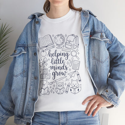 Close up view of TEEZOCA T-Shirt with black and white “helping little minds grow” back to school teacher design on white  fabric.

