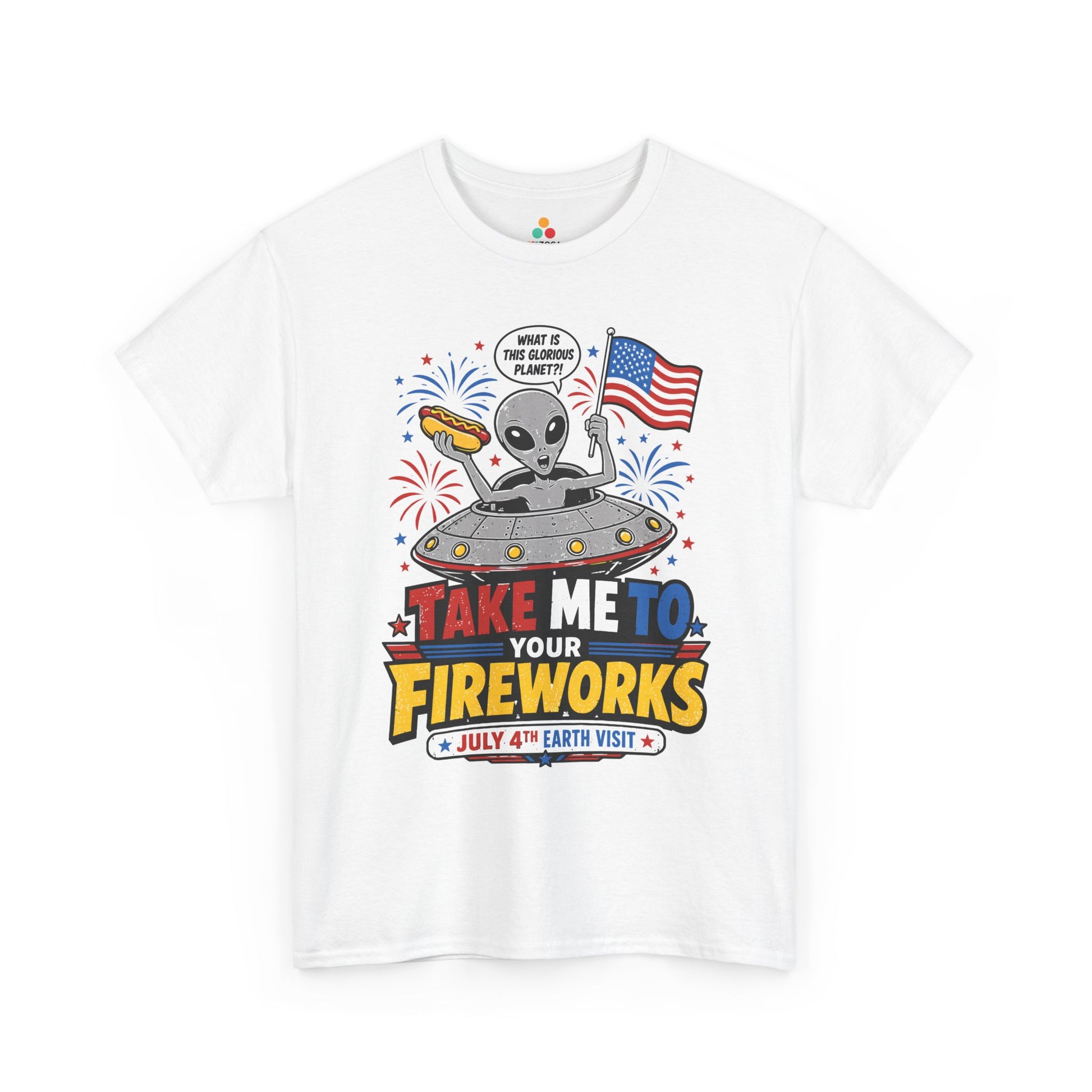 TEEZOCA T-shirt with an alien shirt design featuring a UFO, hot dog, American flag, fireworks, and Take Me To Your Fireworks text.
