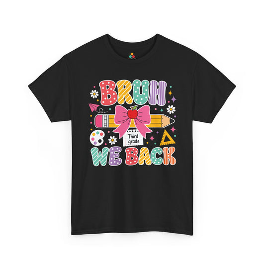 TEEZOCA black Bruh We Back Third Grade shirt laid flat, colorful lettering with a bow-topped pencil and apple, a funny teacher back to school tee.
