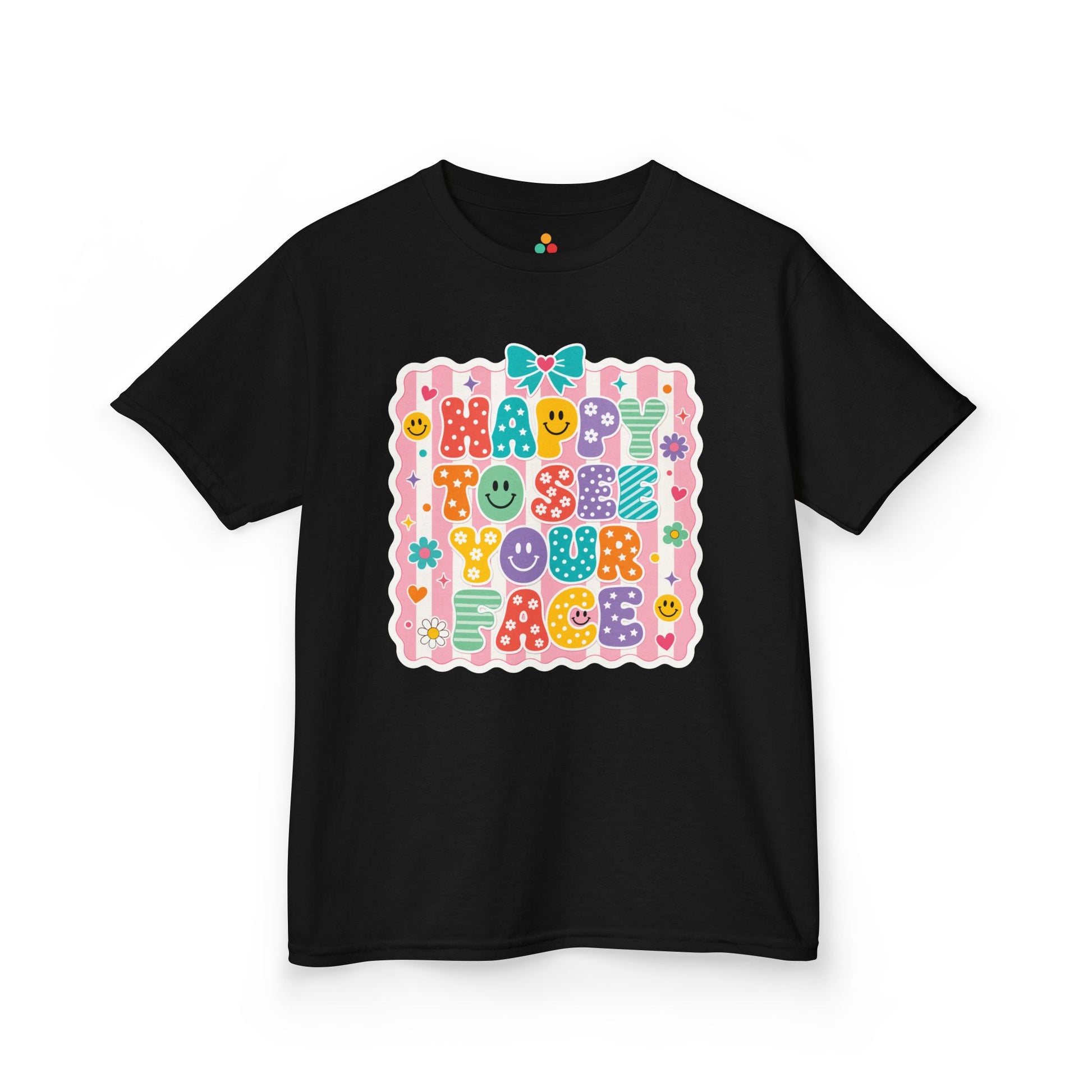 TEEZOCA black Happy to See Your Face kids shirt laid flat, cute coquette lettering with a bow and cheerful faces, a cute back to school tee.
