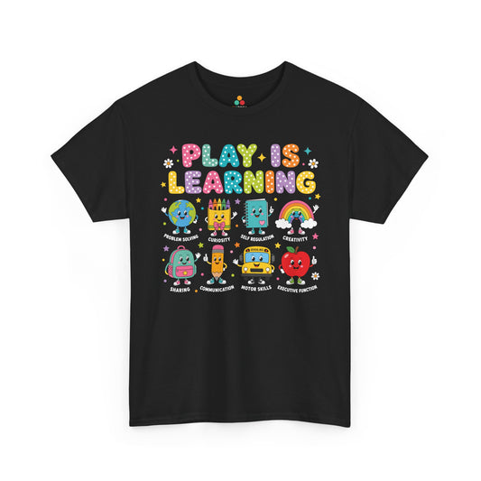 TEEZOCA black Play Is Learning shirt laid flat, bright lettering with friendly school-supply characters, a cute teacher back to school tee.
