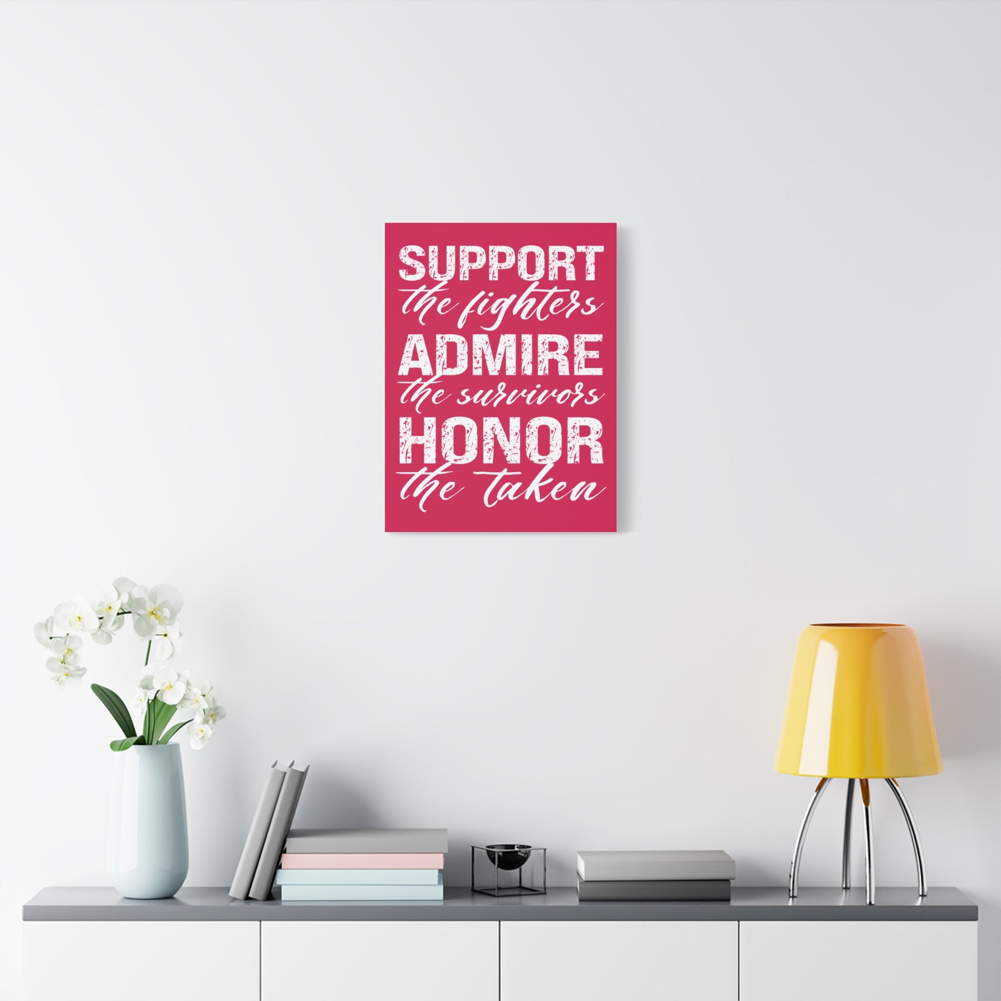 TEEZOCA bold pink awareness wall art styled in a modern living space.