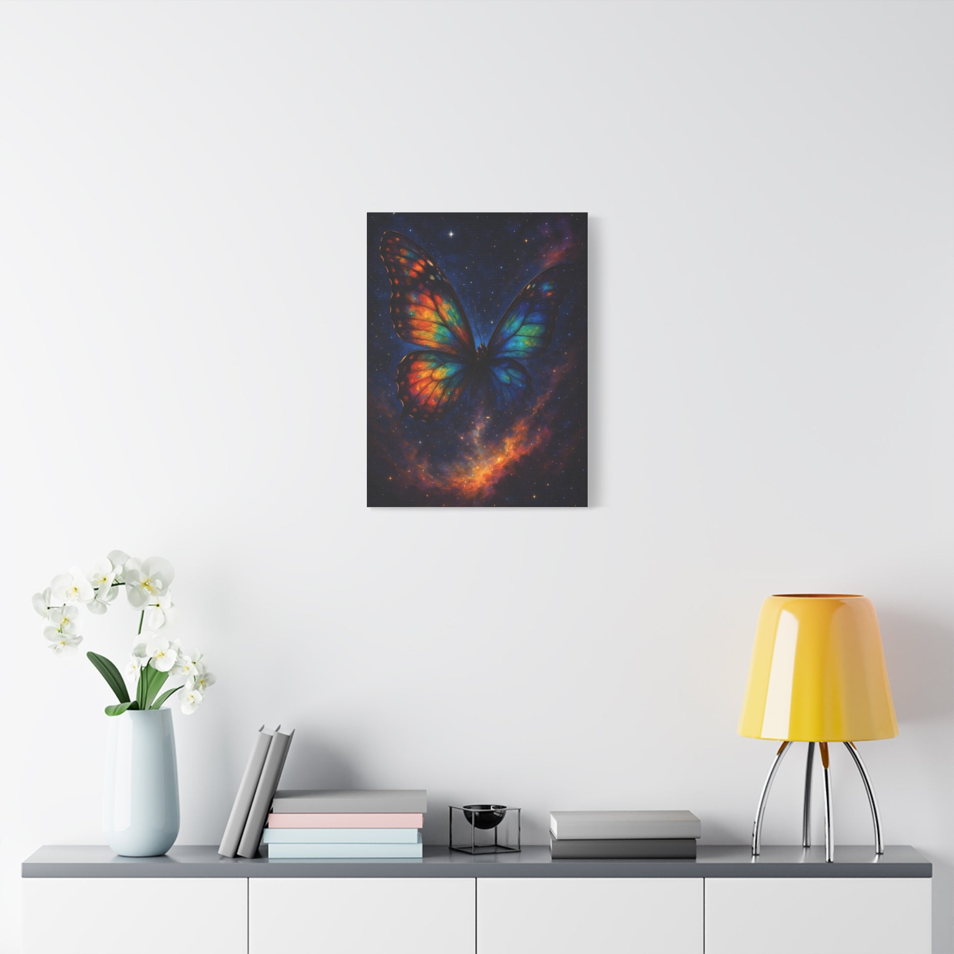 TEEZOCA celestial butterfly canvas hanging above a couch with yellow lamp.