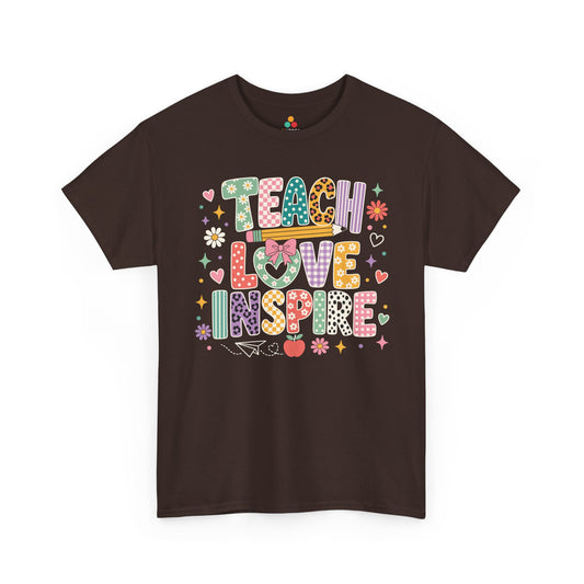 TEEZOCA dark chocolate Teach Love Inspire shirt laid flat, colorful word art with a pencil and apple, a cute teacher back to school tee.
