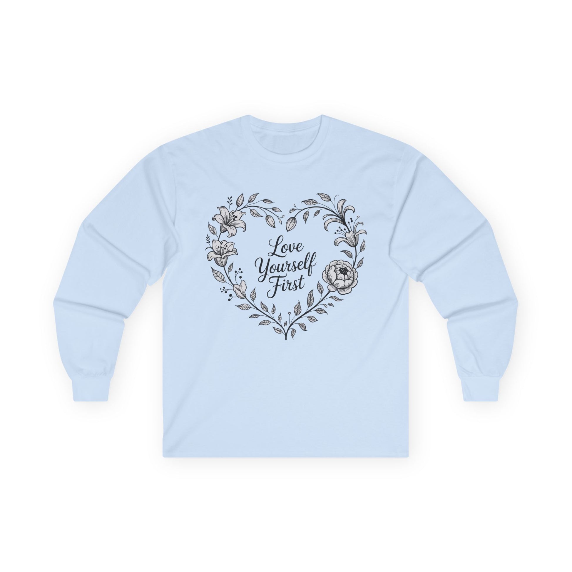 TEEZOCA elegant floral love yourself first design on unisex long-sleeve t-shirt Light blue sweatshirt with floral heart design and 'Love Yourself First' text on a white background