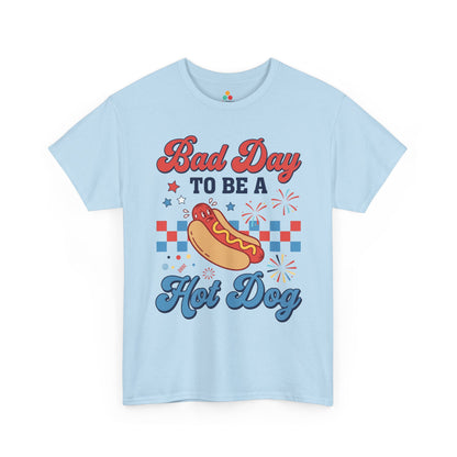 TEEZOCA funny food 4th of july shirt t-shirt featuring a retro hot dog shirt look with fireworks and Bad Day To Be A Hot Dog text.

