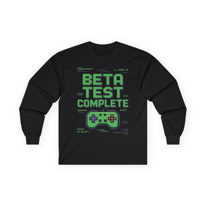 TEEZOCA gamer slogan unisex long-sleeve tee Black long-sleeve shirt with 'Beta Test Complete' text and game controller graphic on a white background