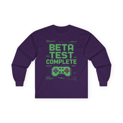 TEEZOCA gaming culture pixel design unisex long-sleeve shirt Purple long-sleeve shirt with 'Beta Test Complete' text and game controller graphic on a white background