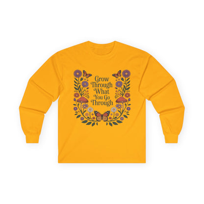 TEEZOCA grow through what you go through floral design on unisex long-sleeve t-shirt Yellow long-sleeve shirt with floral design and motivational quote on a white background