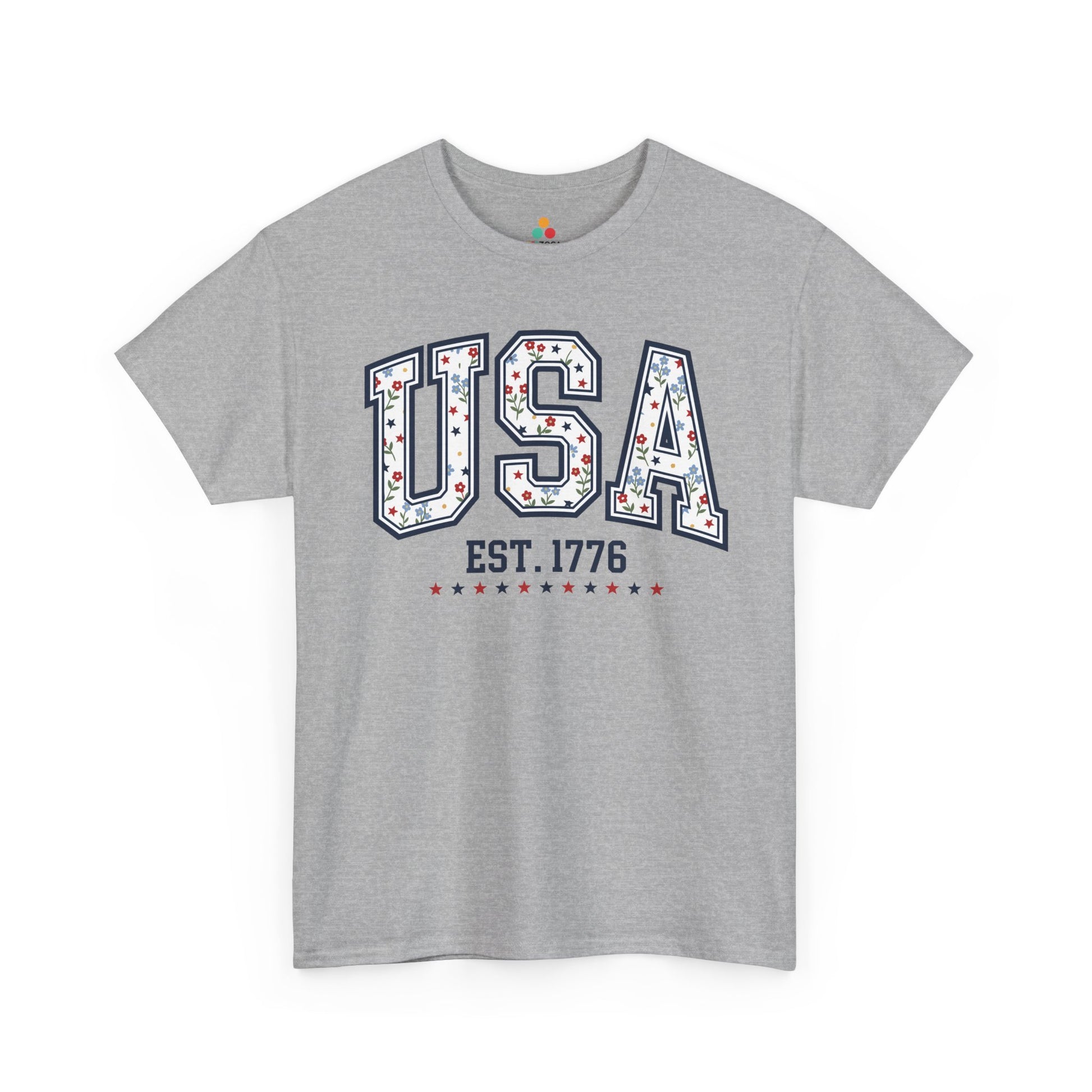 TEEZOCA ladies fourth of july tops t-shirt with floral american flag shirt look, bold navy outlines, and playful USA artwork.
