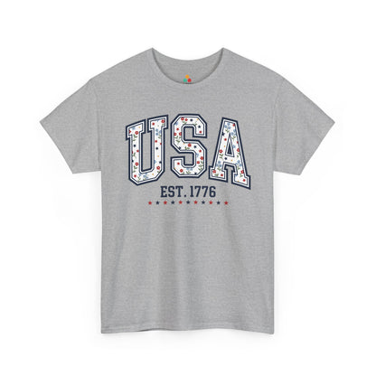 TEEZOCA ladies fourth of july tops t-shirt with floral american flag shirt look, bold navy outlines, and playful USA artwork.
