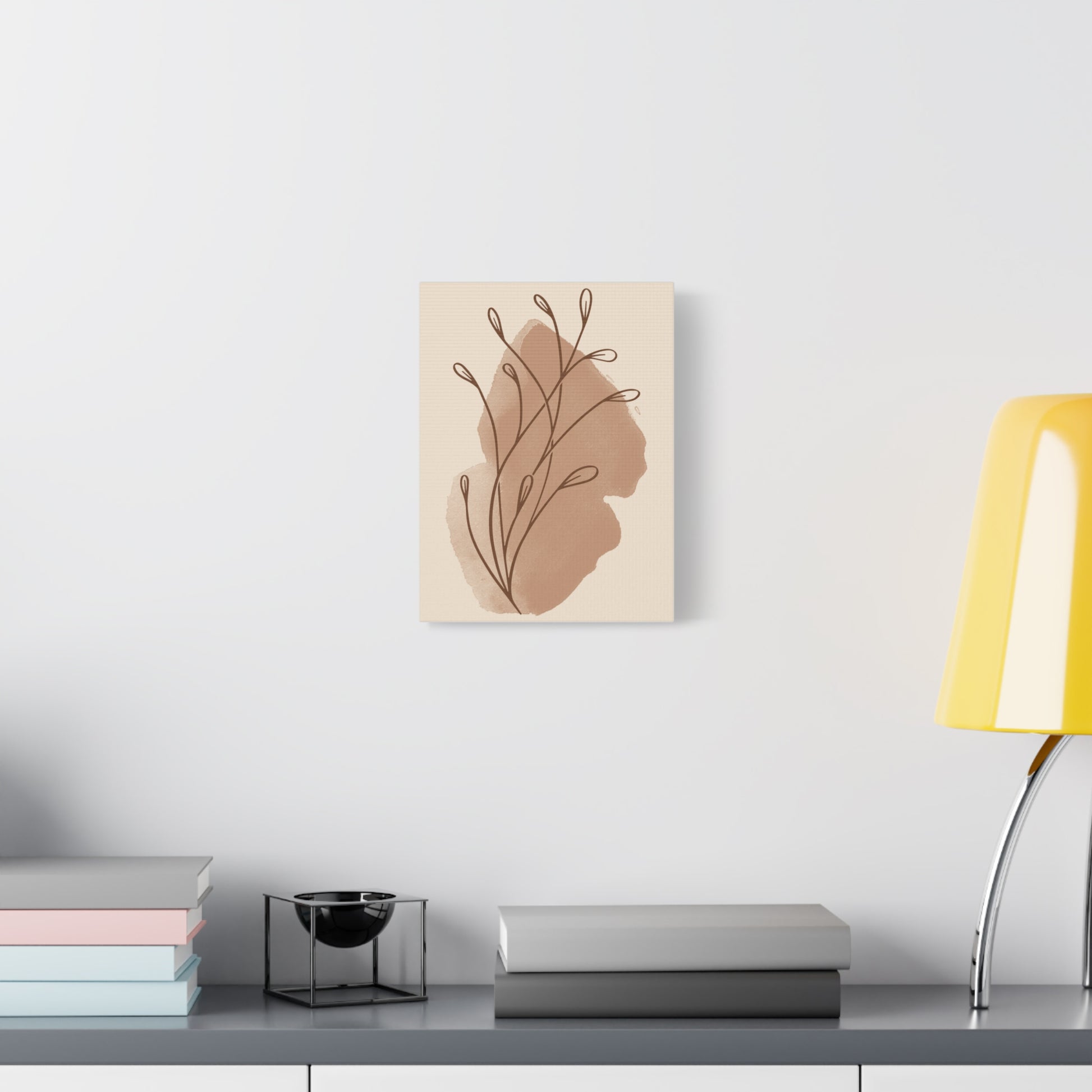 TEEZOCA line art leaf canvas in cozy bedroom with warm lighting accents.