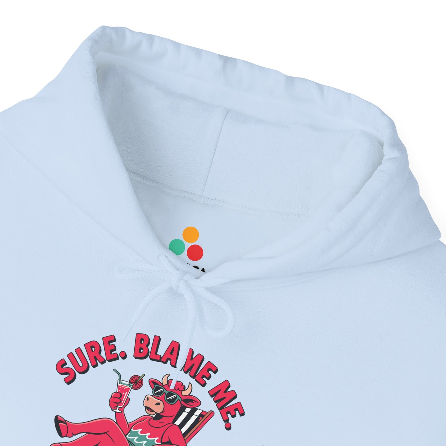 TEEZOCA lounging cow graphic Unisex Heavy Blend Hoodie playful fashion Sure Blame Me Funny Cow Graphic Heavy Blend Hoodie | TEEZOCA 