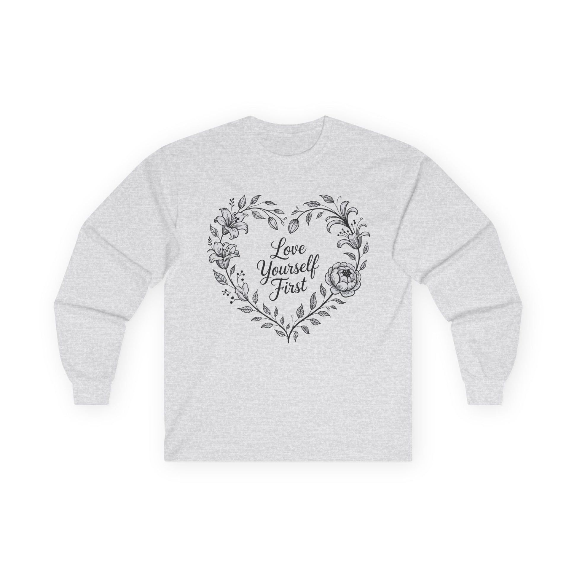 TEEZOCA love yourself first floral heart design on unisex long-sleeve t-shirt Gray sweatshirt with floral heart design and 'Love Yourself First' text on a white background