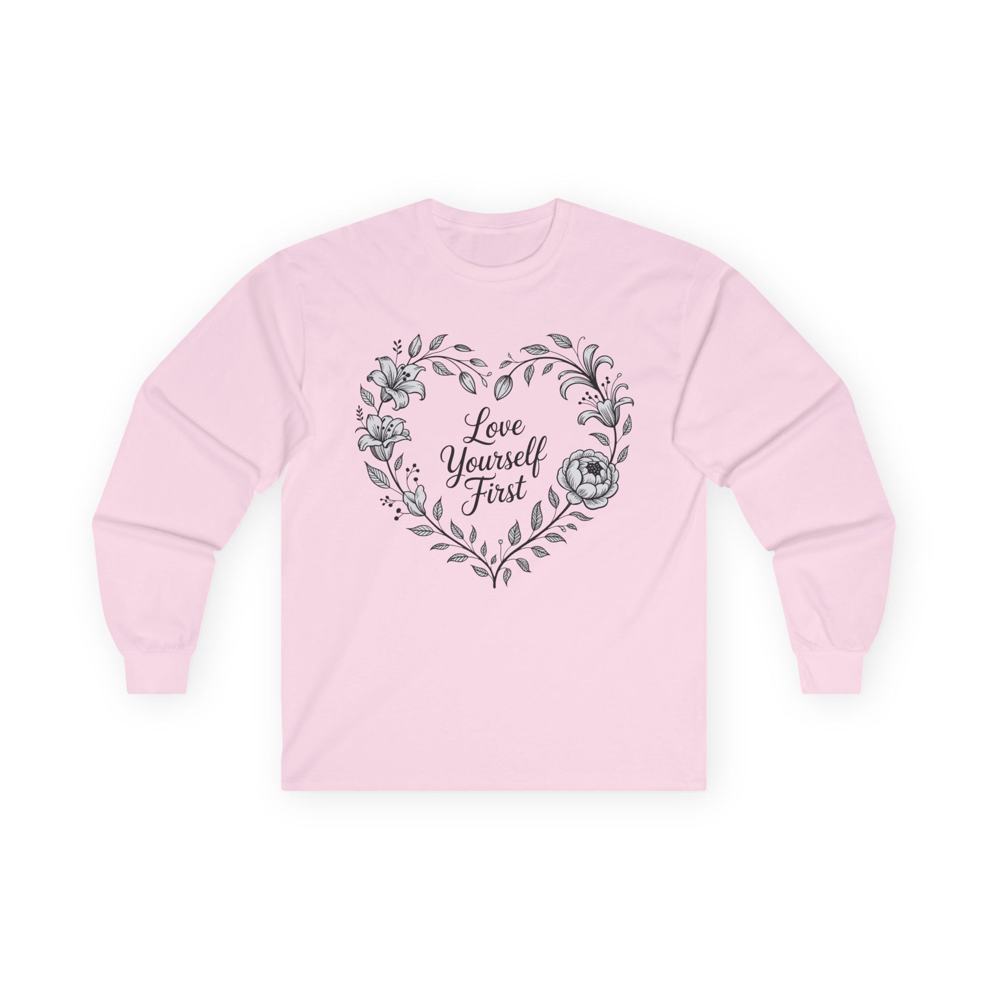 TEEZOCA love yourself first floral heart design on unisex long-sleeve t-shirt Pink sweatshirt with floral heart design and 'Love Yourself First' text on a white background