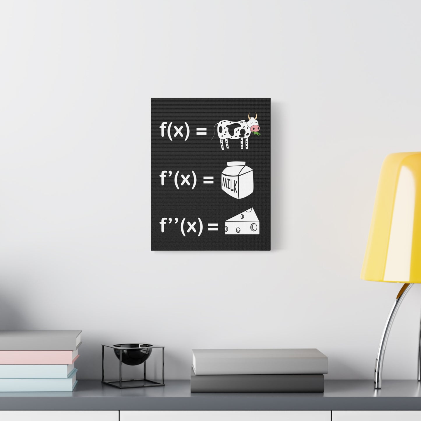 TEEZOCA math derivatives cow canvas hanging above a minimalist couch in a bright living room.