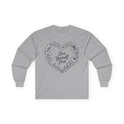 TEEZOCA minimalist floral heart love yourself first on unisex long-sleeve t-shirt Gray long-sleeve shirt with floral heart design and 'Love Yourself First' text on a white background