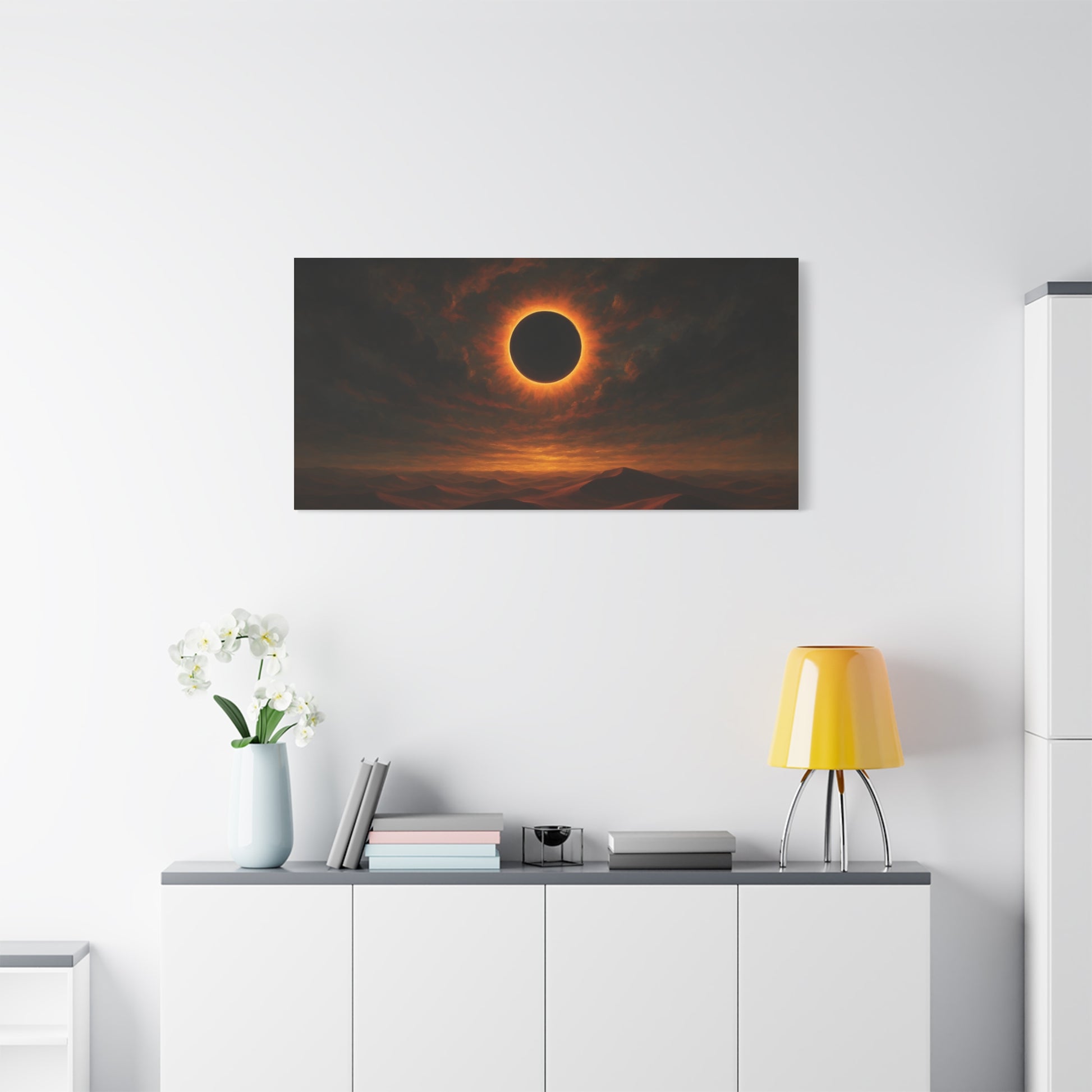 TEEZOCA moody eclipse desert canvas print featured in a bright modern apartment.