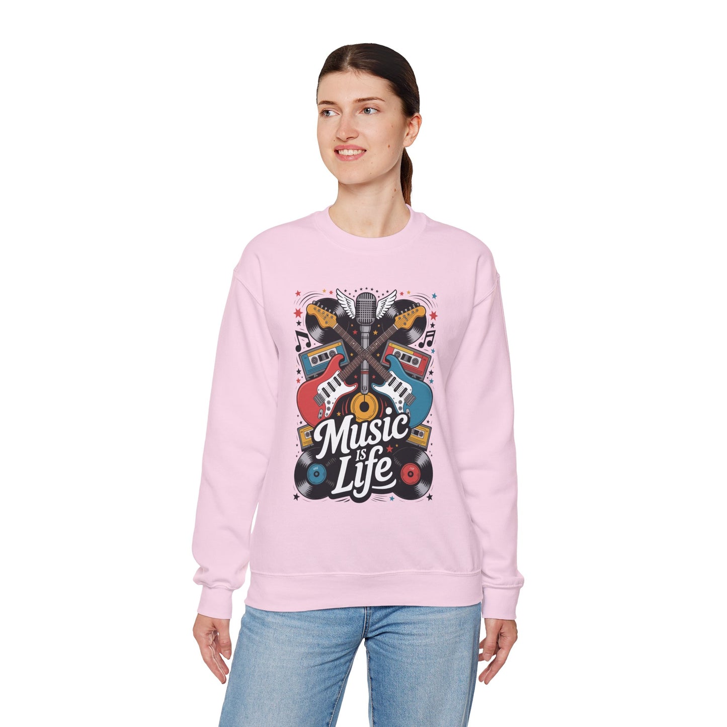 TEEZOCA music is life sweatshirt with guitars vinyl records and retro music design Person wearing a pink sweatshirt with a colorful graphic and 'Music Life' text on a white background