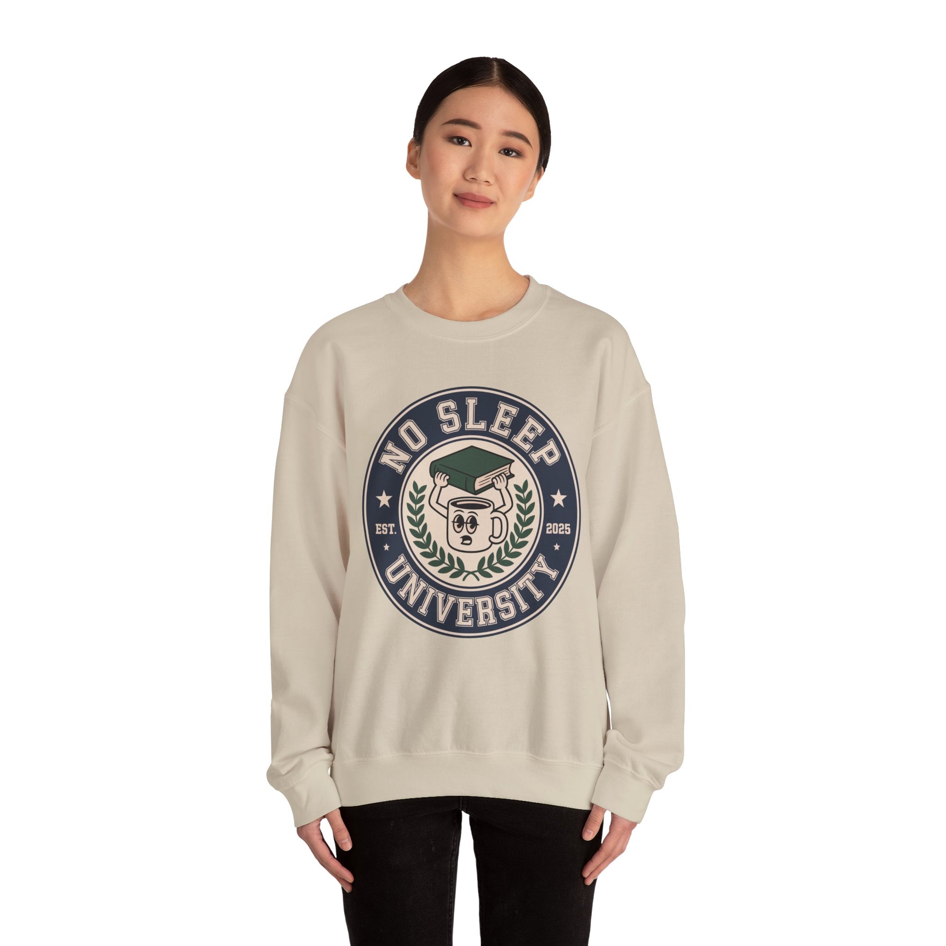 TEEZOCA no sleep university sweatshirt with coffee mug study design Person wearing a beige sweatshirt with 'No Sleep University' logo on a white background