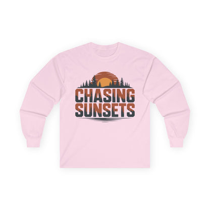 TEEZOCA outdoor adventure sunset unisex long-sleeve t-shirt Pink long-sleeve shirt with 'Chasing Sunsets' graphic on a white background