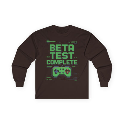 TEEZOCA retro gaming pixel art long-sleeve shirt Brown long-sleeve shirt with 'Beta Test Complete' text and game controller graphic on a white background
