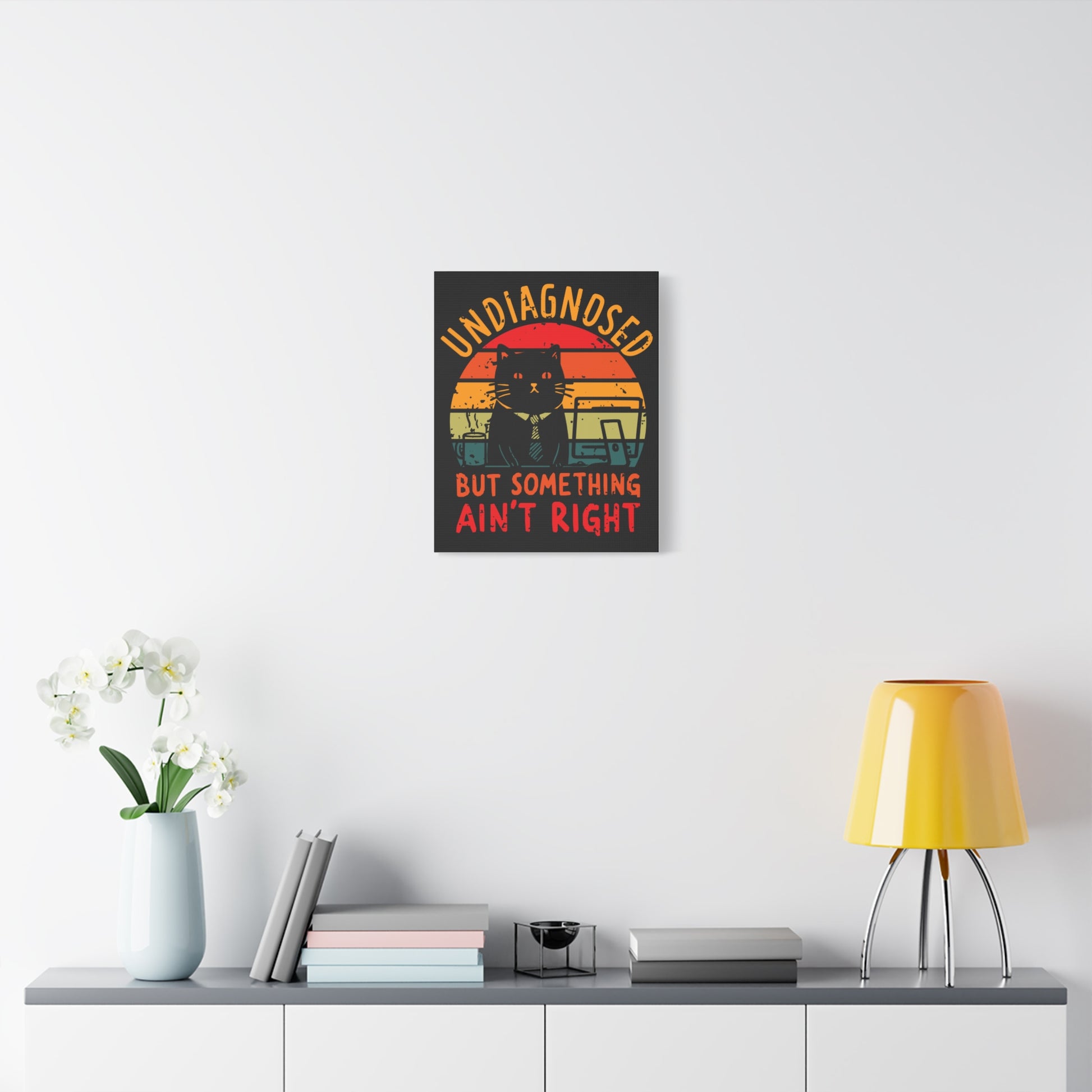 TEEZOCA retro sunset cat canvas displayed over a low console with decor.