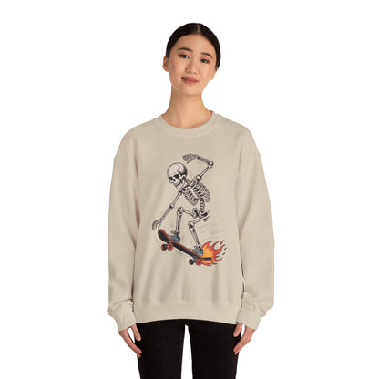 TEEZOCA skateboarding skeleton sweatshirt with flaming skateboard graphic Person wearing a beige sweatshirt with a skeleton on a skateboard design.
