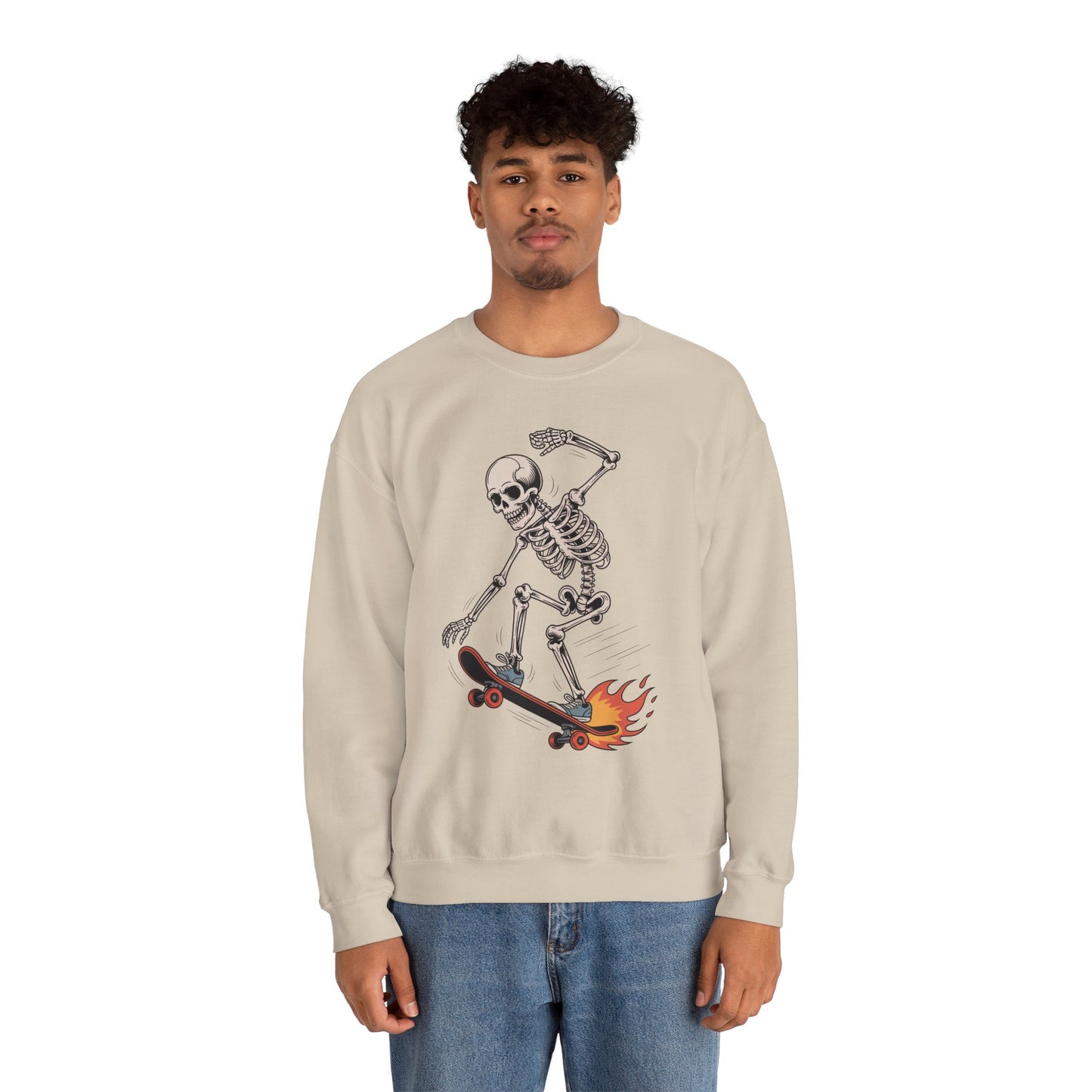 TEEZOCA skateboarding skeleton sweatshirt with flaming skateboard graphic Person wearing a beige sweatshirt with a skeleton on a skateboard graphic