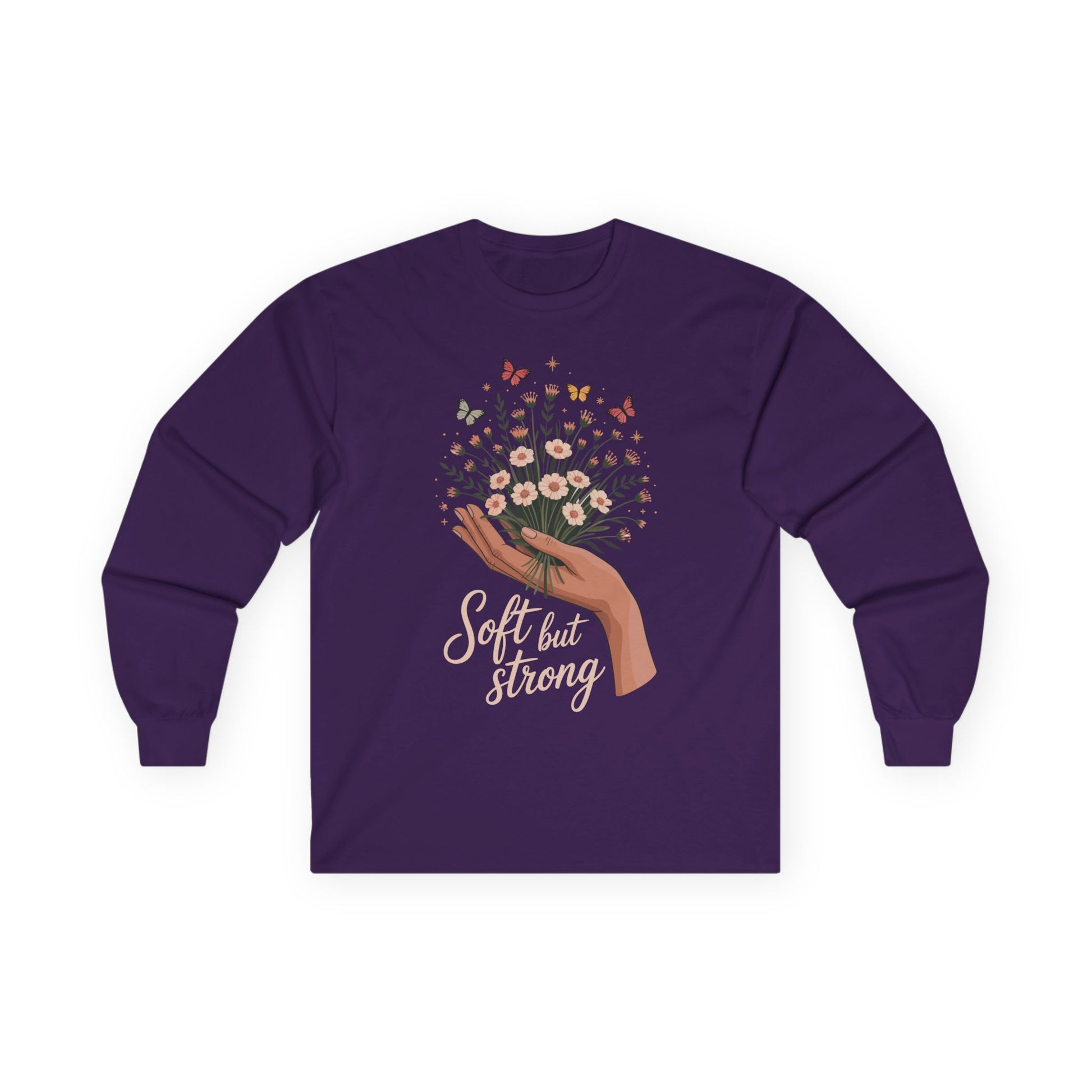 TEEZOCA soft but strong empowerment graphic on unisex long-sleeve t-shirt Purple long-sleeve shirt with floral design and 'Soft but Strong' text on a white background
