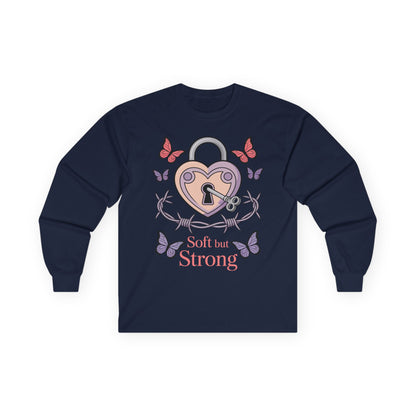 TEEZOCA soft but strong heart lock design on unisex long-sleeve t-shirt Navy blue long-sleeve shirt with heart-shaped lock design and 'Soft but Strong' text on a white background