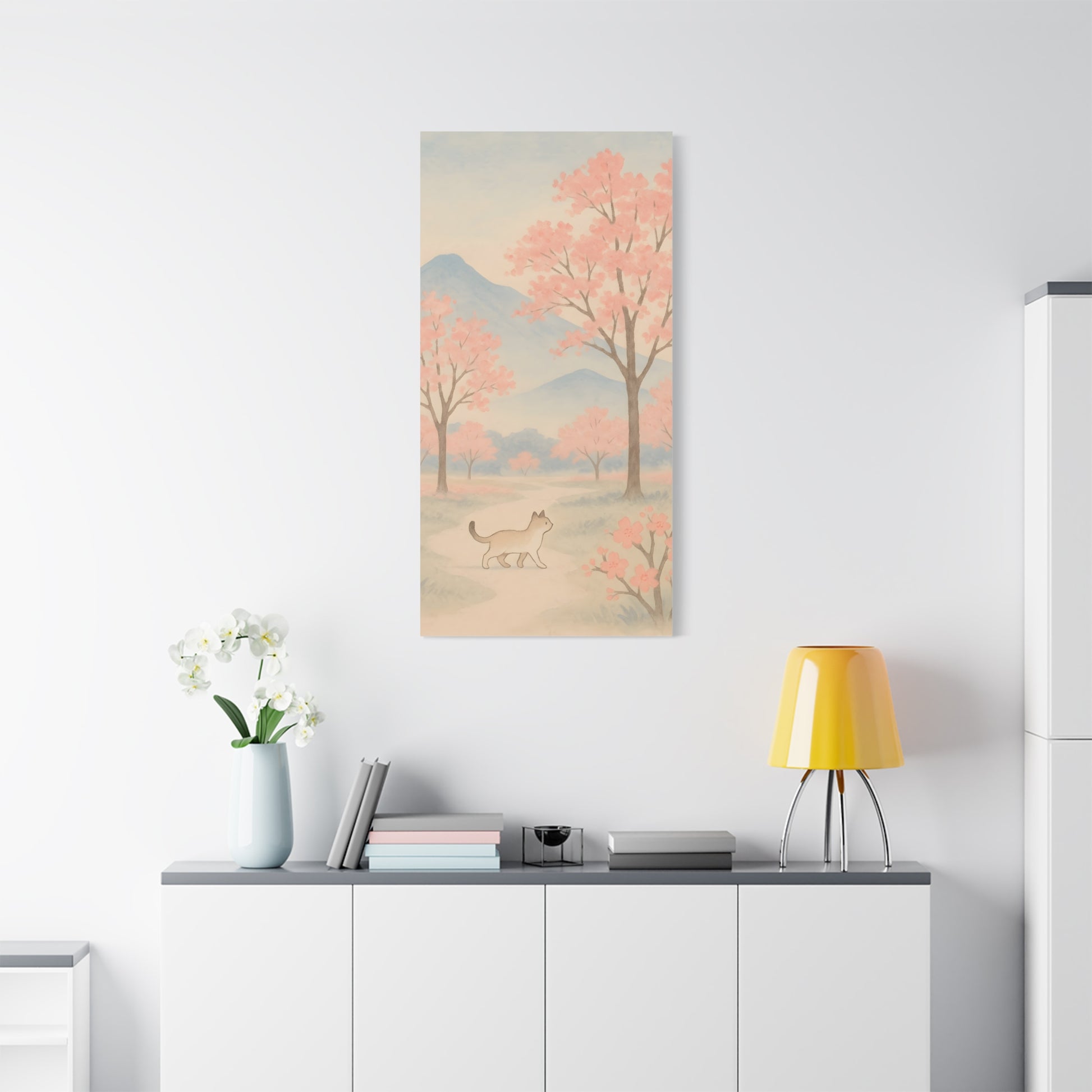 TEEZOCA soft cherry blossom wall art with cat character styled above a low cabinet.