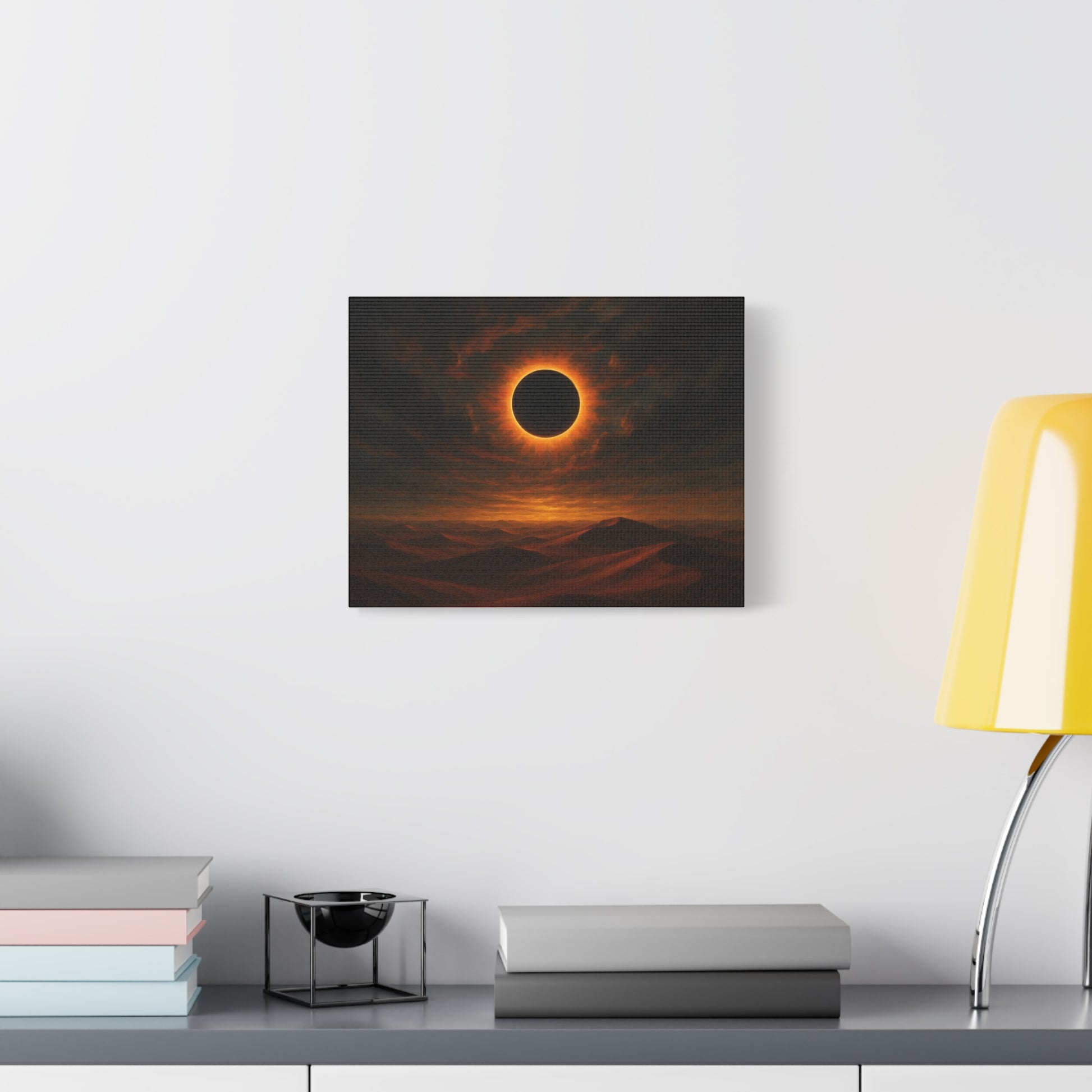 TEEZOCA solar eclipse desert canvas hanging above a minimalist couch in a bright living room.