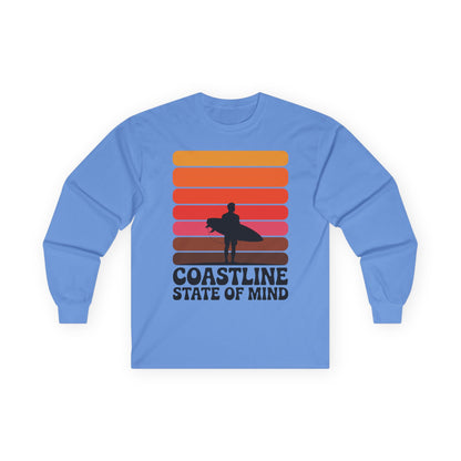 TEEZOCA surf silhouette sunset long-sleeve tee Blue long-sleeve shirt with colorful design and text on a white background
