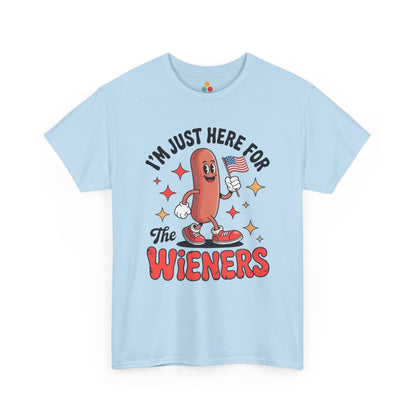 TEEZOCA t-shirt featuring a 4th of July Hot Dog Shirt design with a smiling hot dog, small American flag, stars, and I'm Just Here for the Wieners Shirt text.
