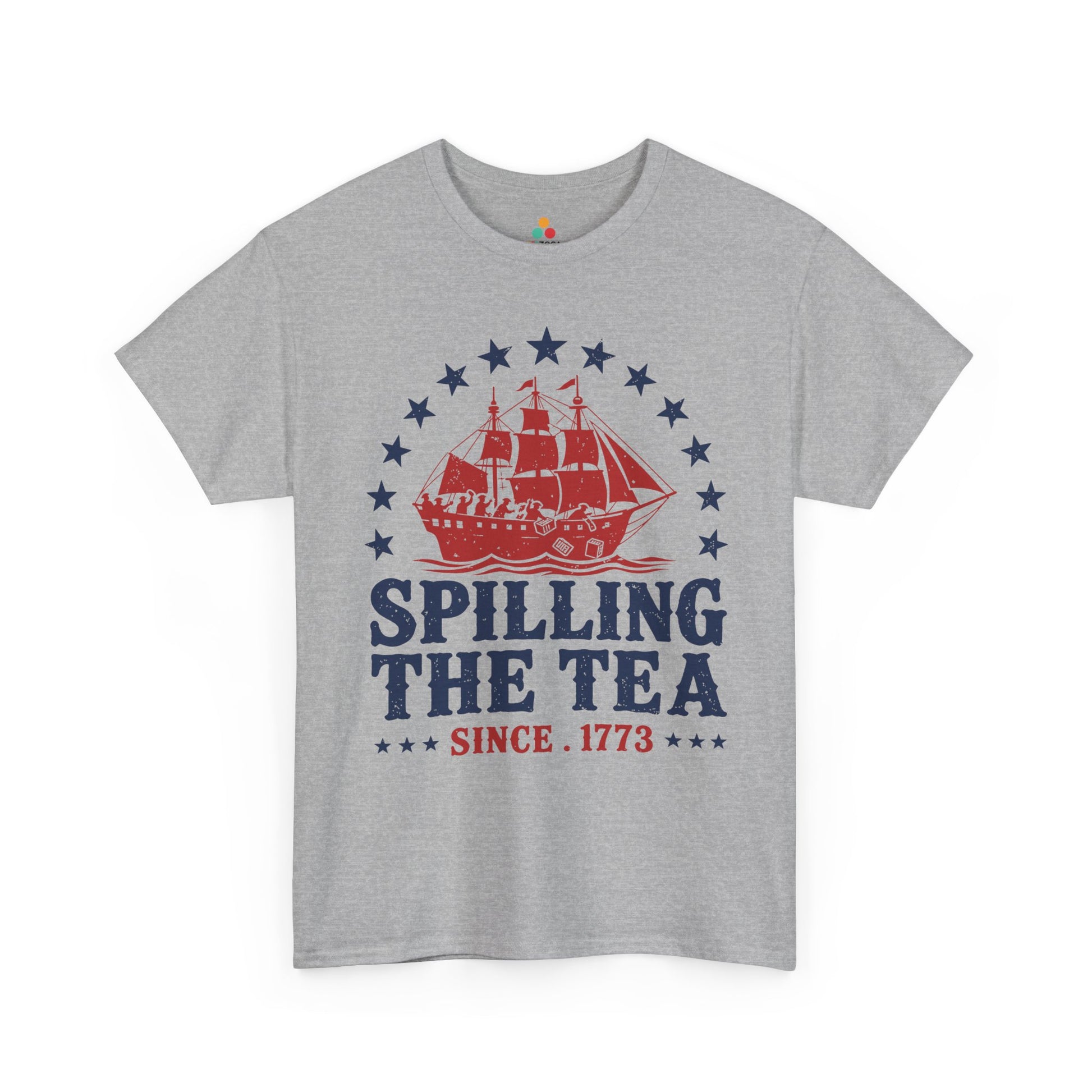 TEEZOCA t-shirt styled as an Independence Day shirt, with red ship graphics, tea crates, waves, and distressed patriotic lettering.

