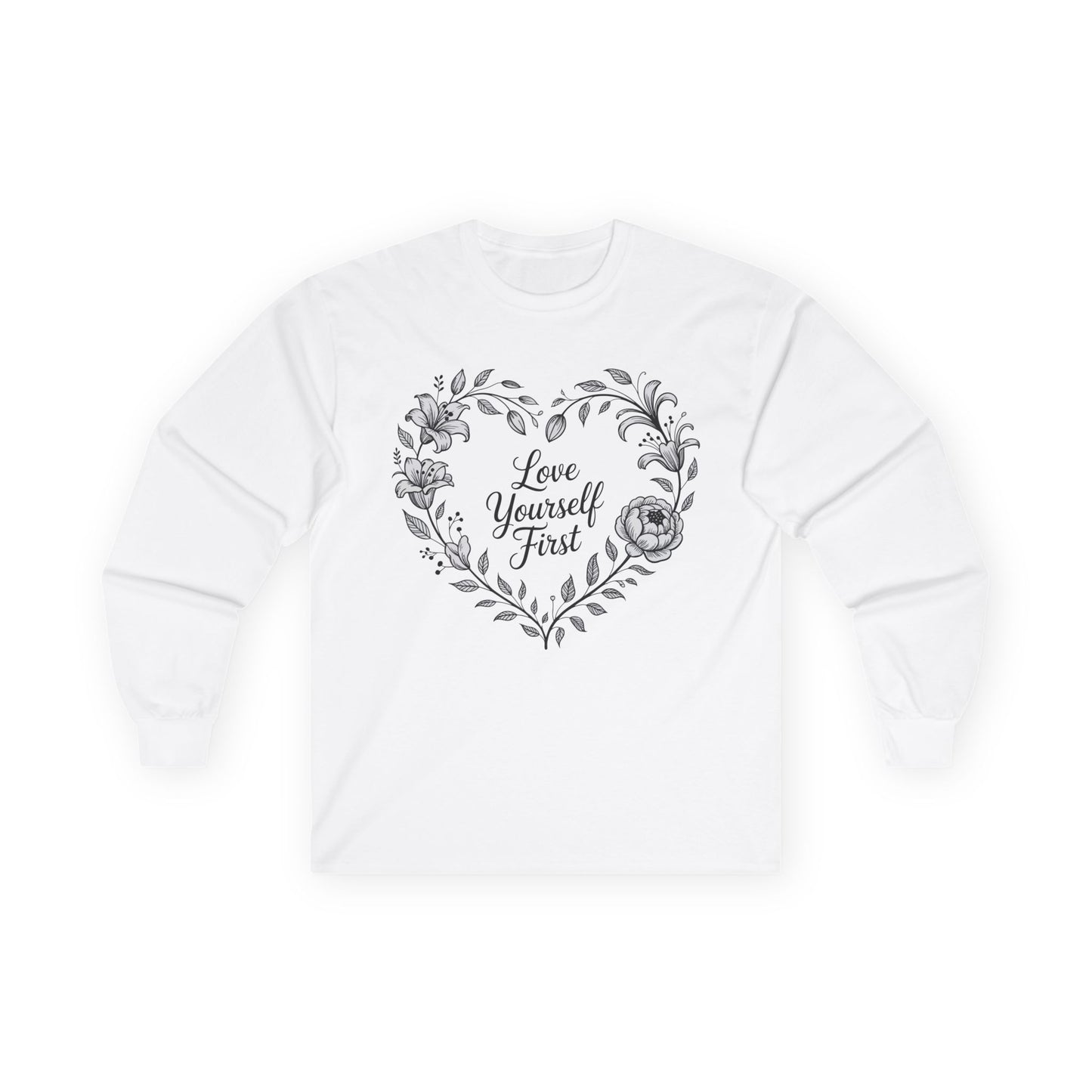 TEEZOCA unisex long-sleeve t-shirt with love yourself first floral wreath artwork White sweatshirt with floral heart design and 'Love Yourself First' text on a white background
