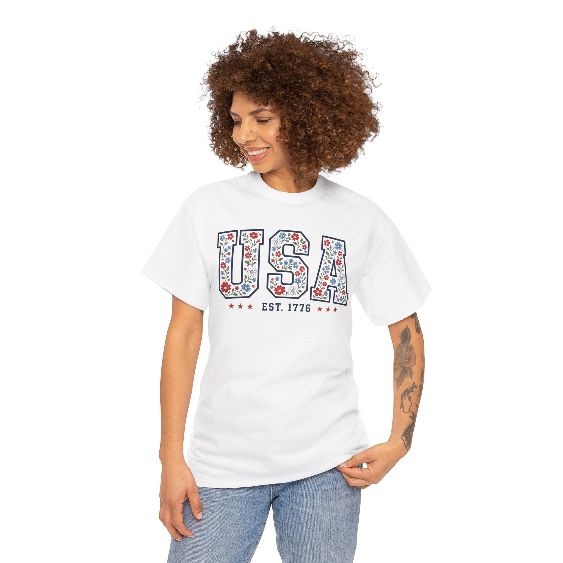 TEEZOCA usa shirt women t-shirt featuring cute floral American flag style, bold USA lettering, and patriotic star accents.
